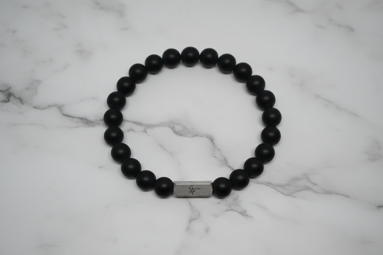 Flat lay — Bracelet Noir Intemporel homme